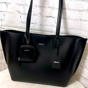 DKNY tote in Black leather .. fits 14" laptop